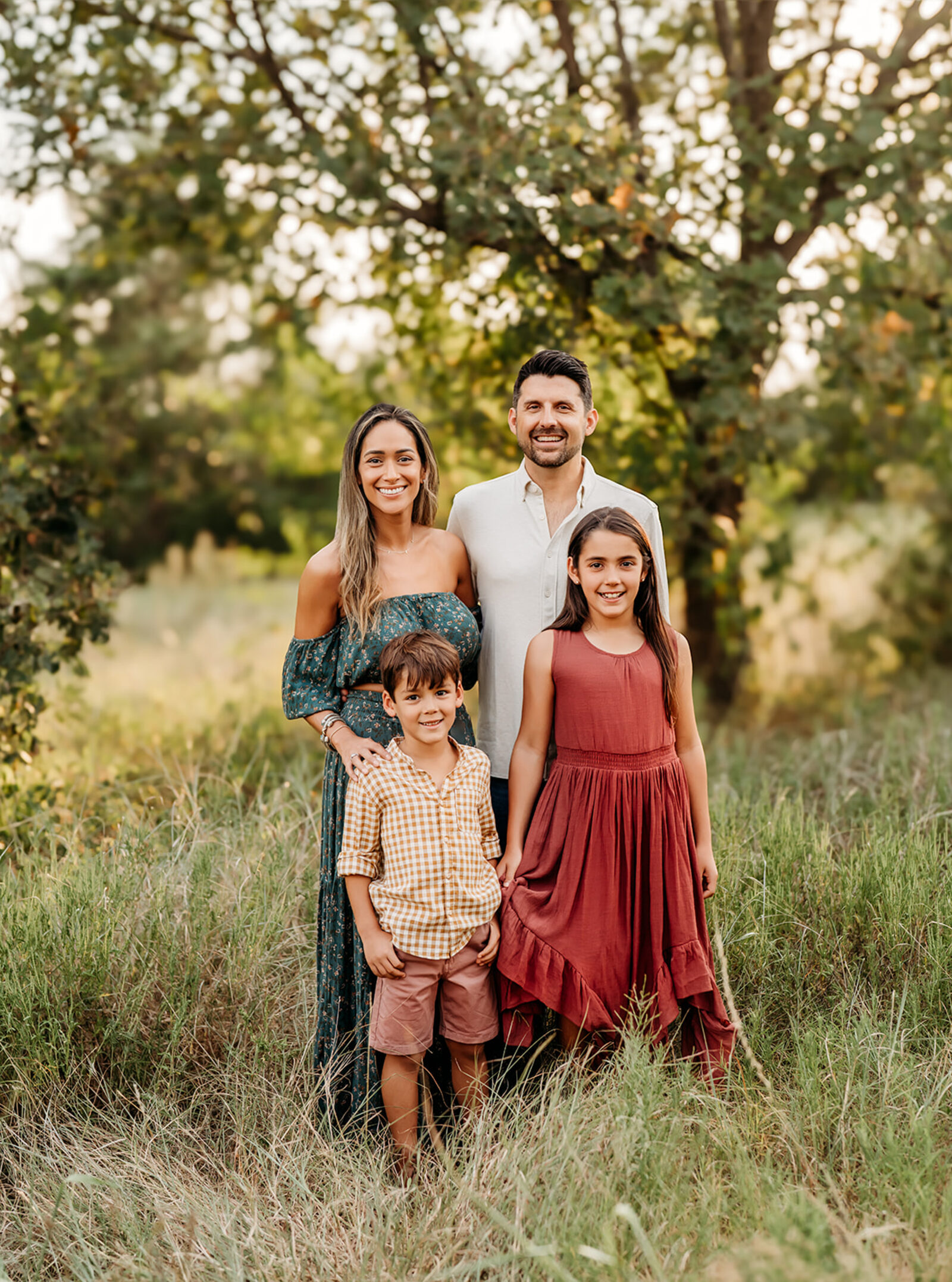 Carlos with his wife Stephanie and their two children, Avery and Bennett